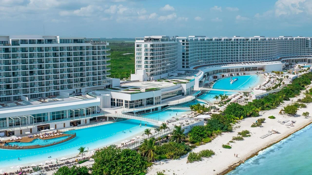 AVA Resort Cancun curving along the Caribbean shoreline